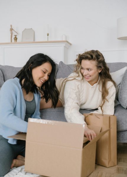 Women Opening Boxes